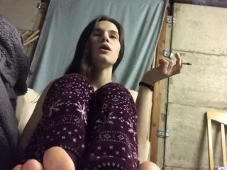 Petite Slut Smokes While Showing Off Dirty Feet