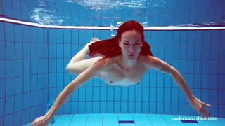 Martina Swims Nude: Sizzling Pool Action