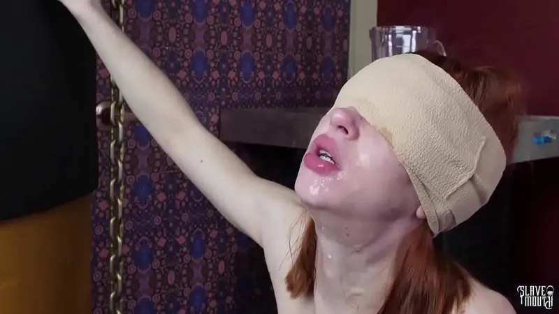 Redhead Slavegirl Gags, Swallows Cum