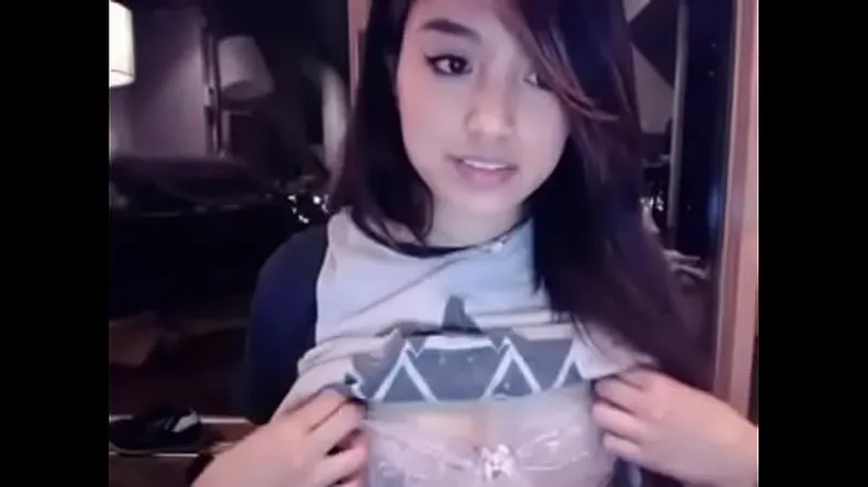 Eurasian Cutie Shows Big Tits