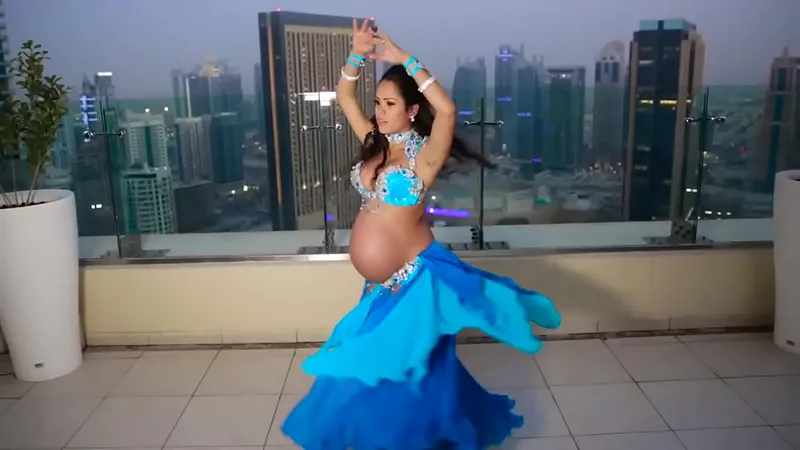 Pregnant Babe Dances & Strips Hot