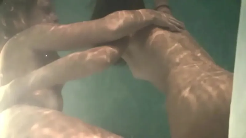Lesbian Swimmers Hotly Touch & Undress Poolside
