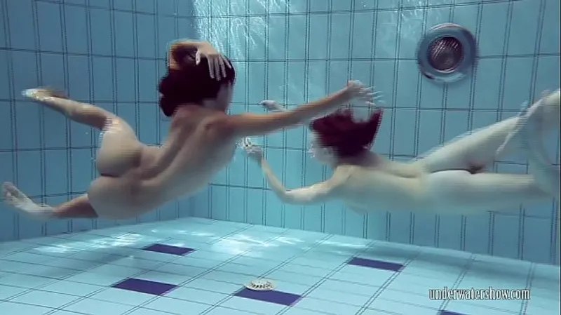 Bushy & Round Ass Strippers Swimming Nude