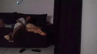 stepmother shares sofa with stepson.