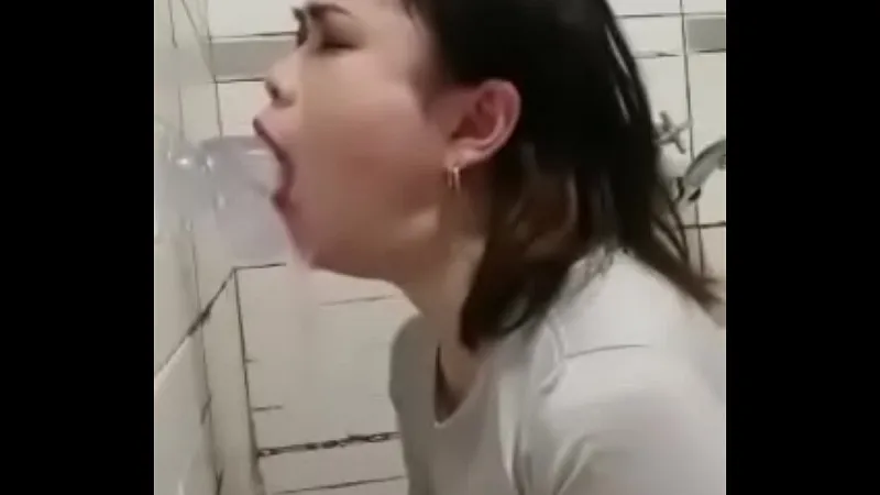 Asian Girl Self Facefucks With Dildo