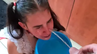 Pigtailed whore gets walked to her bowl. I piss on her slut face and into the bowl. She decides to lap it up like a good little doggy.