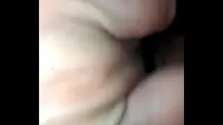 Touching her puchita with her fingers
