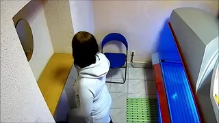 Horny Girl in the Public Solarium while fingering filmed with the voyeur camera