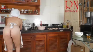 Nudist housewife Regina Noir cooks at the kitchen. Naked maid. Naked housewife.c2