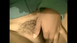 Hairy girl masturbates for her boyfriend while listening to music