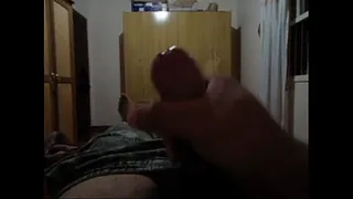Masturbating