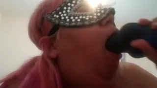 Slut gags on dildo