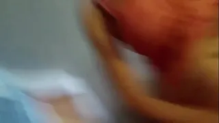 sucking on her husband