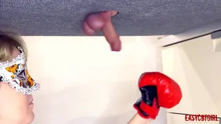Bitch with boxing gloves practicing hitting my balls on the milking board