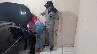 Naughty employee fixes the hottie's car in the workshop!