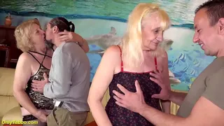 two horny grannies get fucked rough in the ass by their big dick toyboys at a spontaneous groupsex orgy