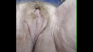 Granny fucks hairy pussy with cucumber