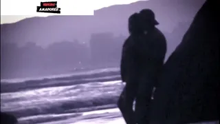 Couple having hidden sex on the rocks