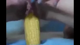 Girl penetrating with corn