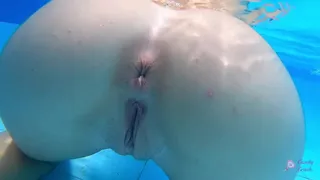 Hot teen masturbating in the pool