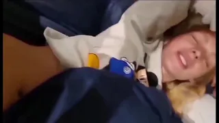 Hot wife in her Minnie Mouse sweater hiding under blanket