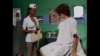 Black booty nurse in sexy uniform satisfies her patient with her huge boobs