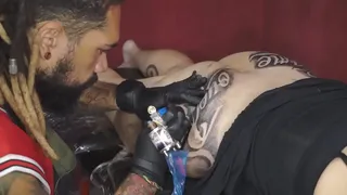 Hot teacher getting tattooed in the ass by a black man