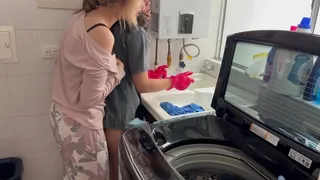 Two lesbians having silent sex in the kitchen.