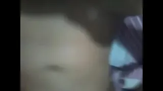 Young girl touching herself in bed