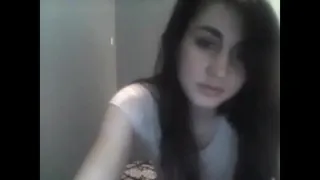 She's spreading her legs and rubs clit