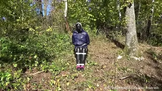 Woman tied up in the woods
