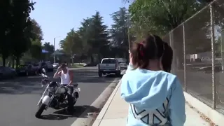 The girl likes motorcycles