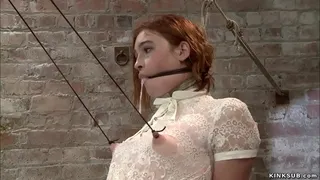 Beautiful tied redhead lesbian slut Jodi Taylor is bound clothed and gagged gets caned and hard whipped by lezdom Claire Adams on hogtie