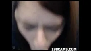 Stunning eyes camwhore sucking on a toy