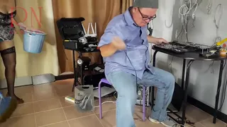 A stripped cleaner maid collects cables and computer parts in a box.