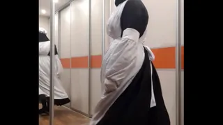 Edwardian maid in apron and hijab