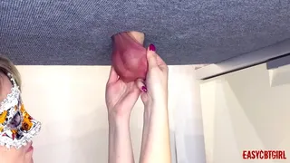 On the milking table, a dick with balls pulled back by a slut who loves when male genetics hang to the knee