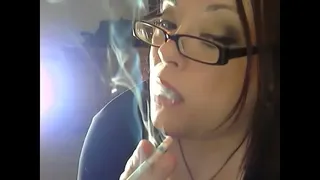 Chubby Mistress Dangles Her Cigarettes As She Smokes