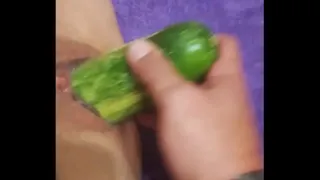 My wife with her cucumber