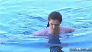 Naughty teenager showing her sexy hot wet body and her amazing natural big boobs by the pool