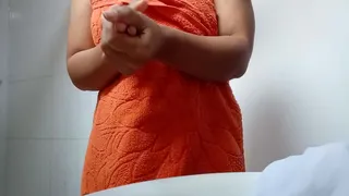 Homemade video leaks of sexy Latina in thong in the bathroom, perfect natural tits.