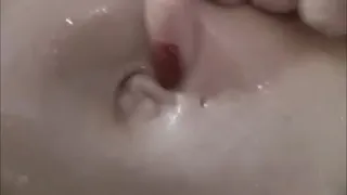 sexy girl doing some hot belly play with oil