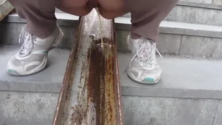 Mature pussy loves to pee in public places and mark the stairs on the street with her urine.