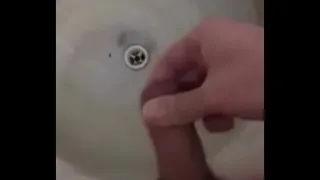 Intense handjob in the kitchen