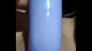 Woman playing with vibrator