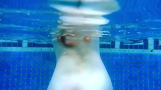 Ariel Ortiz loves to swim in the pool, while her neighbor watches her masturbate. She is a sexy redhead, who loves to be watched in the pool real homemade