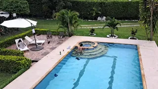 While my stepsister is tanning, I fuck her friend in the pool. Part 2.