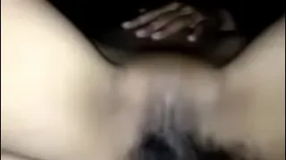Spreading the pussy of a pretty girl, stuffing his cock in her pussy hole until he cums on her clit.