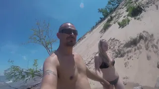 Walking on the dunes and finding places to fuck. Beautiful blonde gets rammed outdoors.