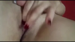 rubbing her pussy